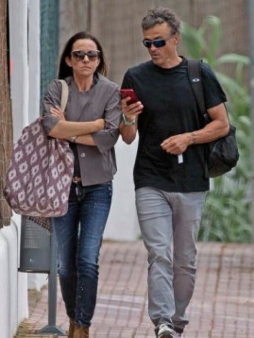 picture of Elena and Luis Walking on a road